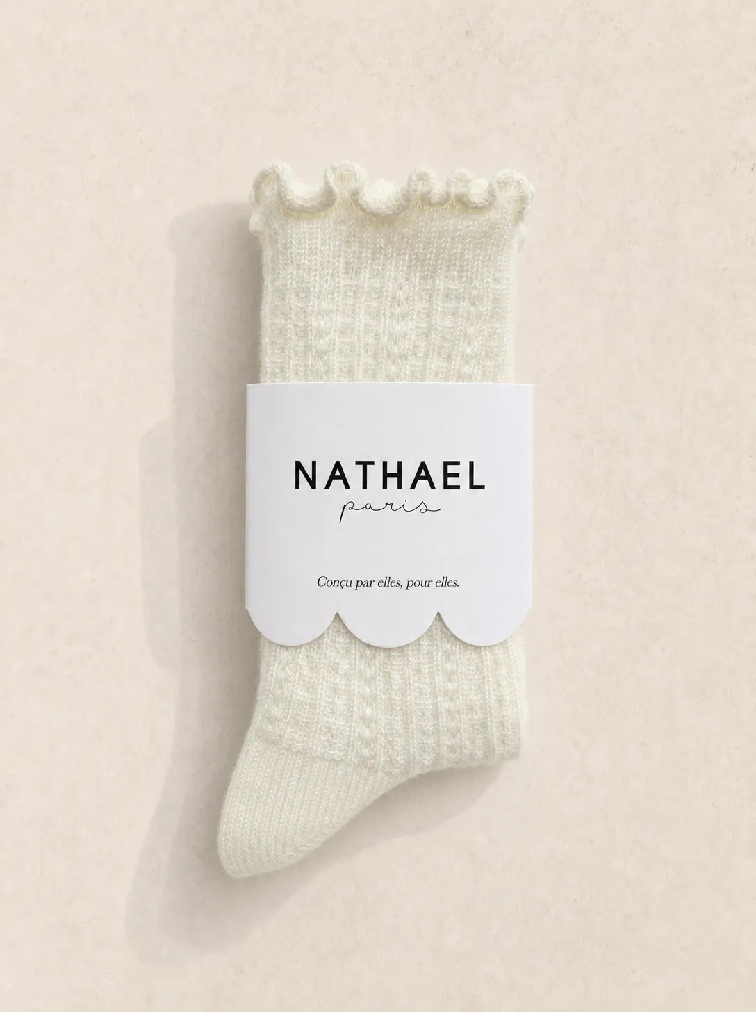 Paire de chaussette La Pointelle écru photographiée à plat